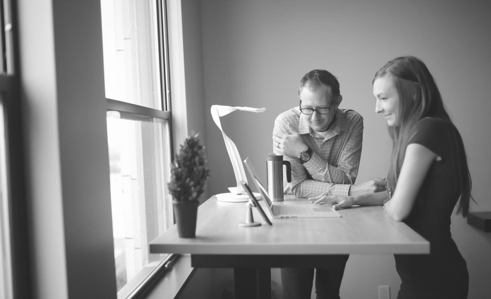 Financial planning workspace with charts and strategic documents